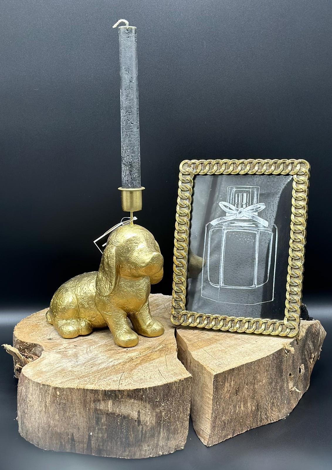 Gouden teckel kandelaar met kaars